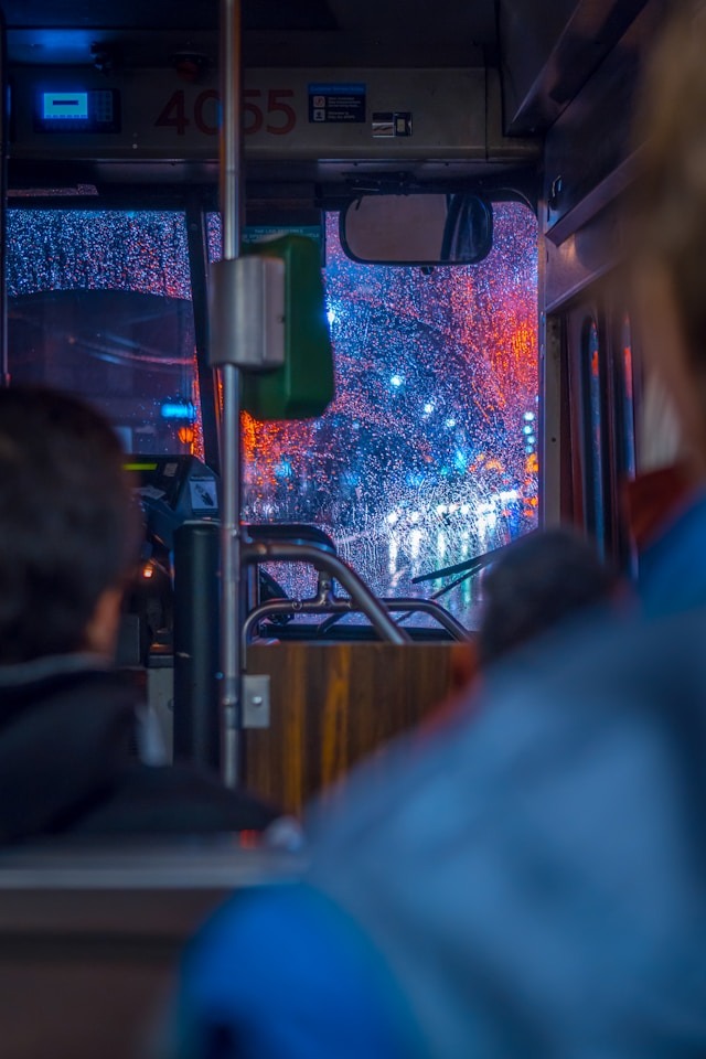 Picture of people riding the bus
